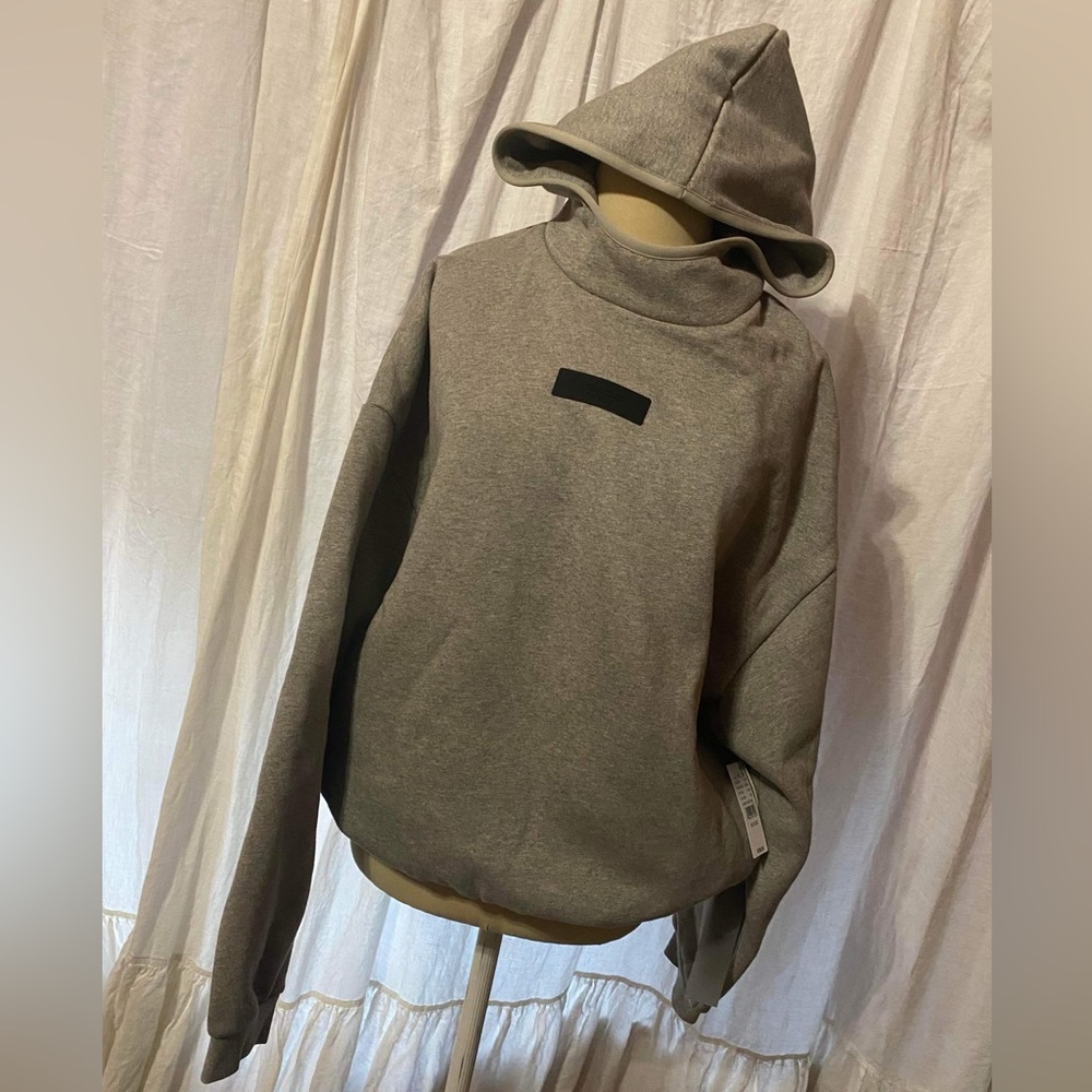 Brand new with bag 2023 Essentials line. The color is dark heather oatmeal
